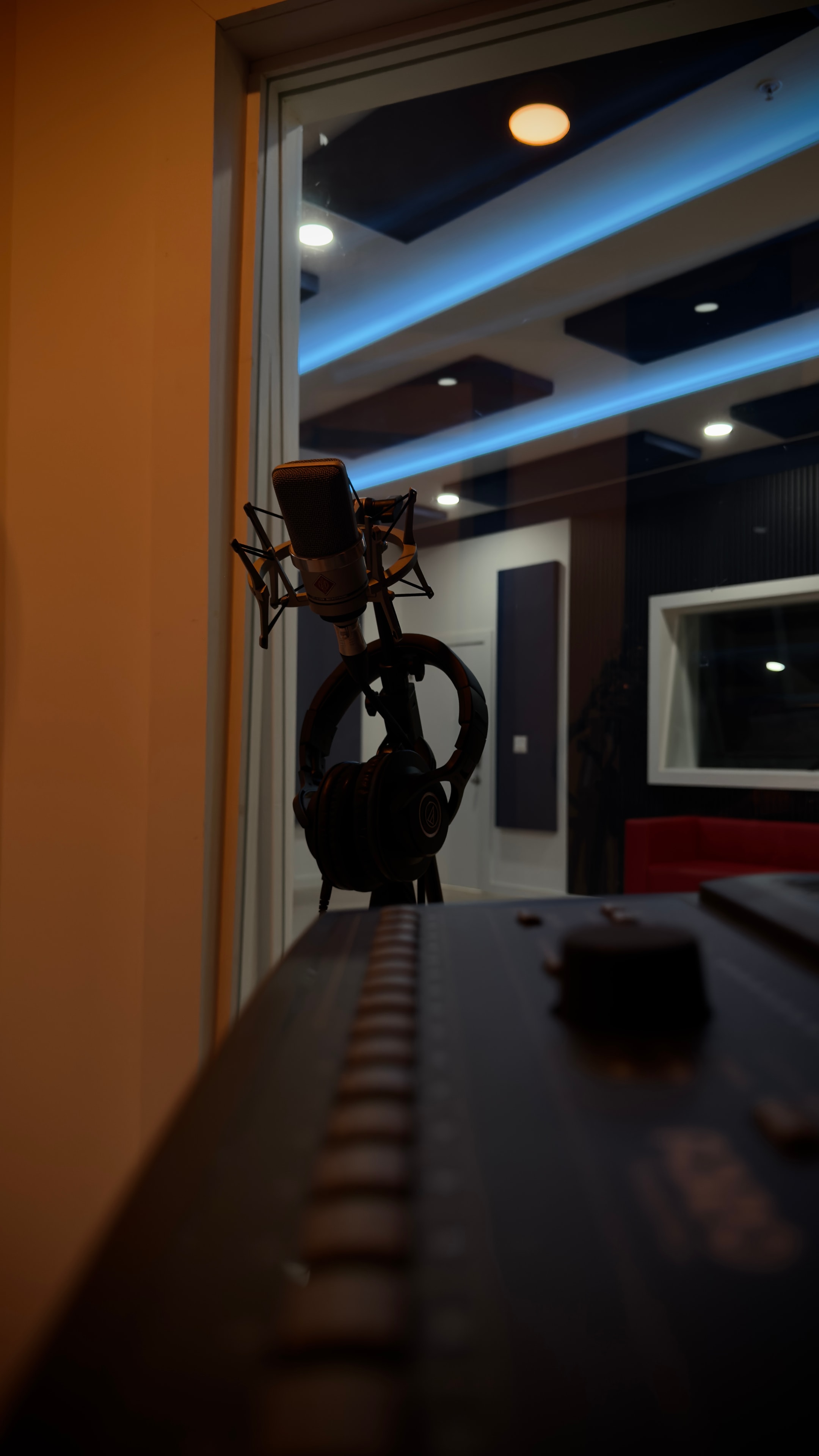 Mic through the glass with live room behind